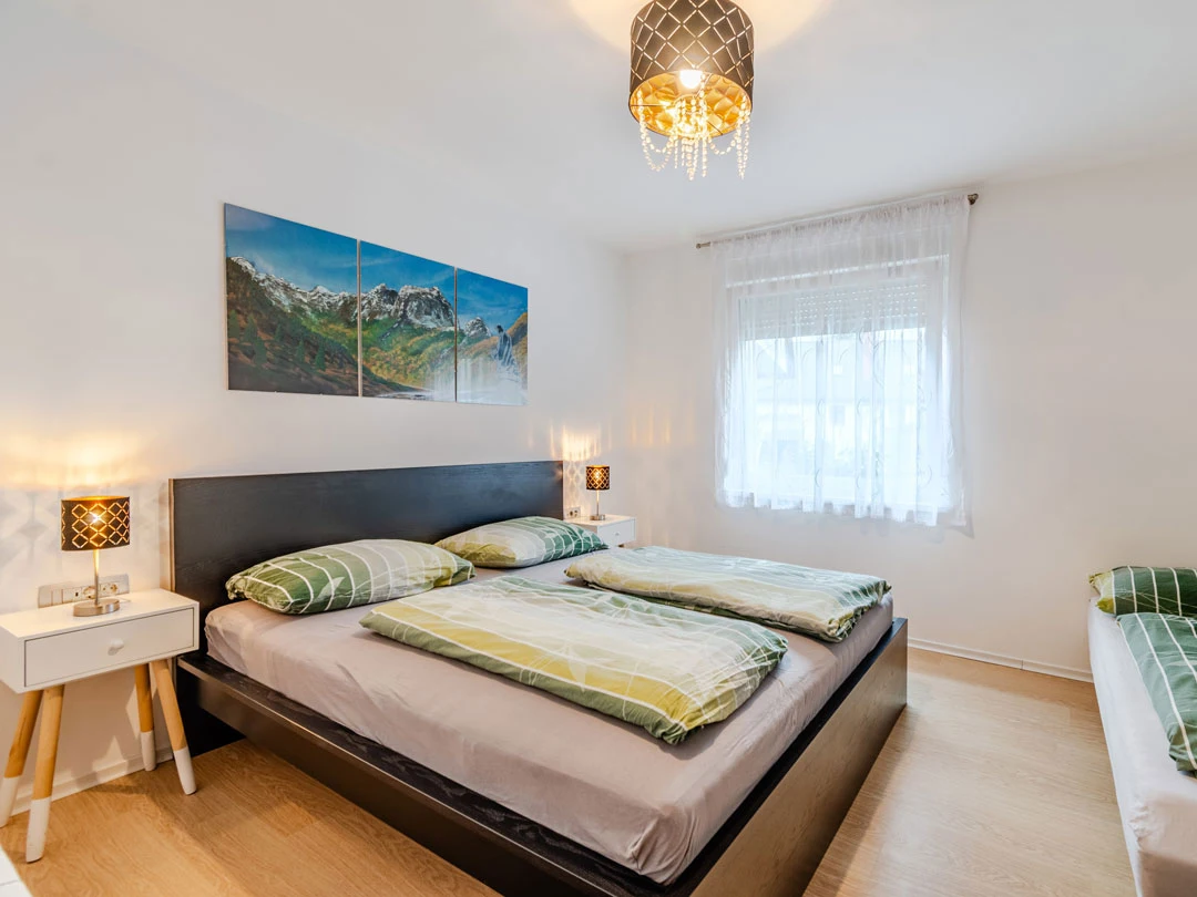 bedroom with a double bed - apartment lev