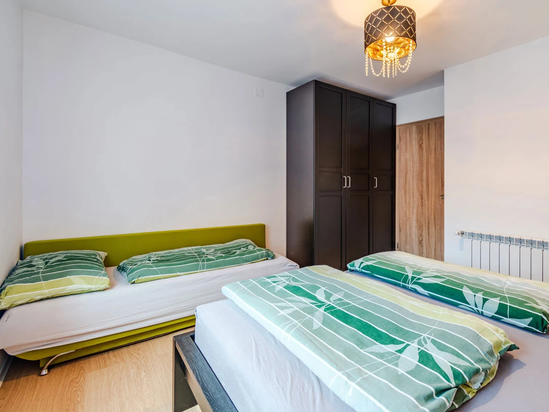 bedroom with two beds - apartment lev