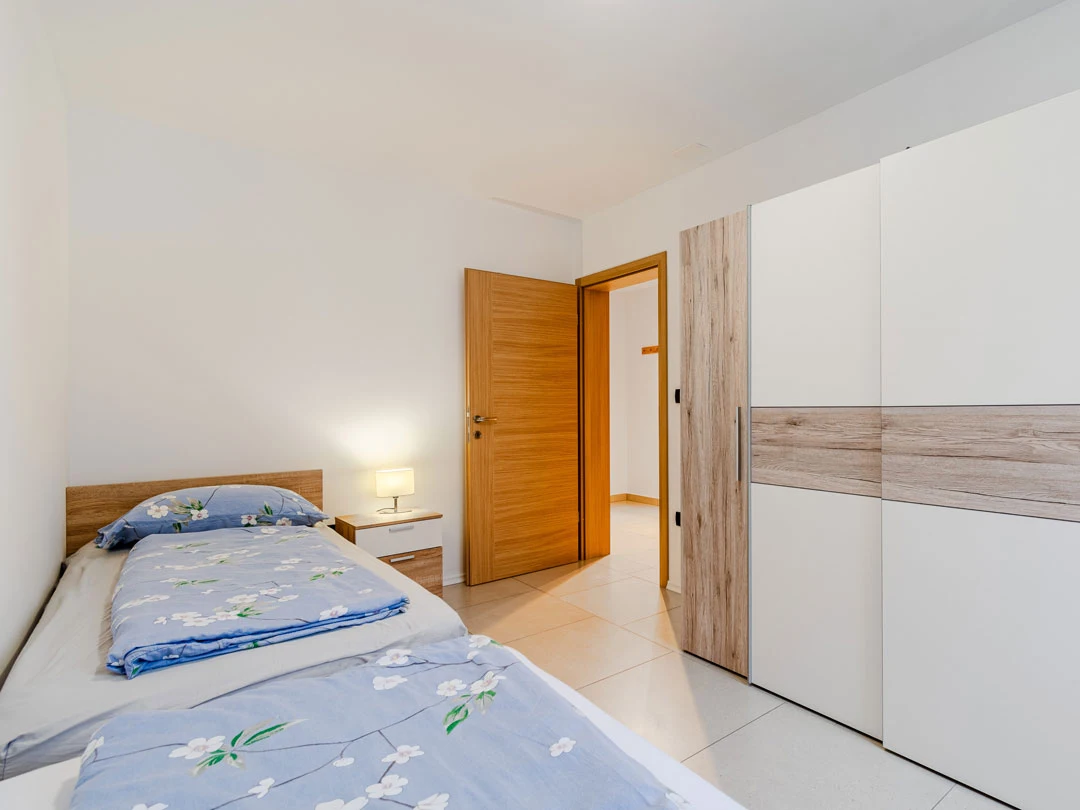 bedroom with two beds - apartment misc