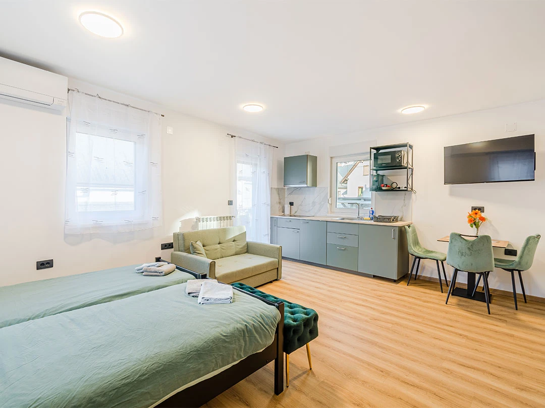 bedroom and kitchen -apartment gusto